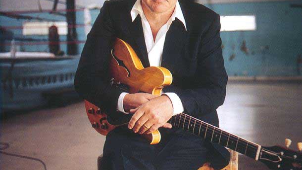 Image of Mark Knopfler, Dire Straits guitarist and Singer c. 1995